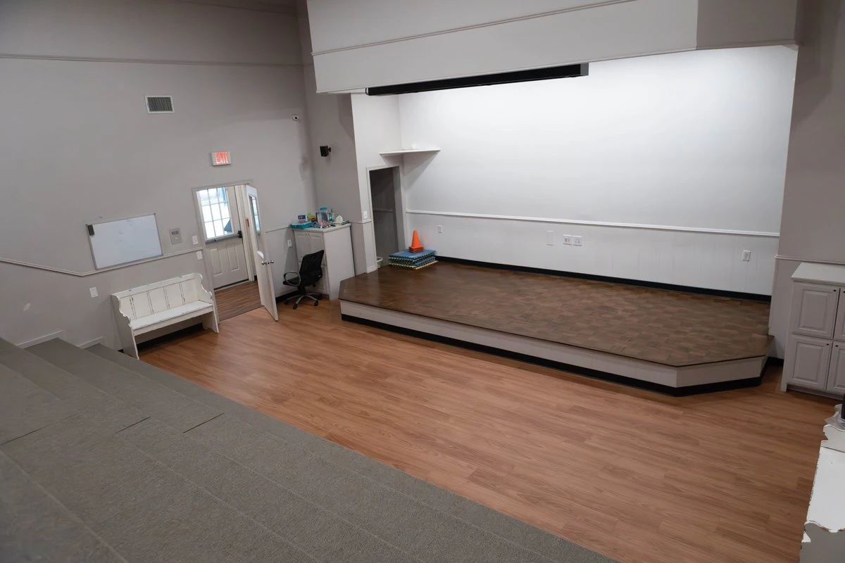 Children developing literacy skills in a cozy reading corner