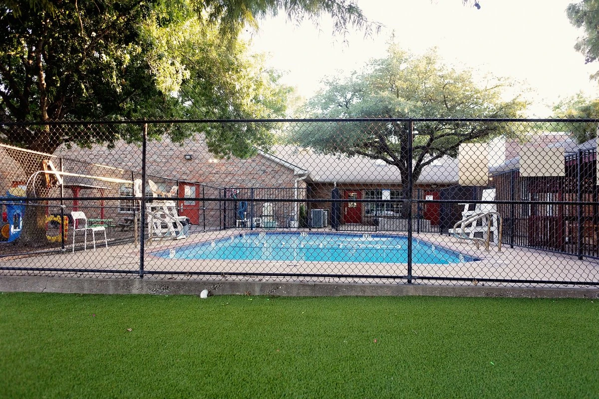 Children playing team sports and developing physical skills on the outdoor playground
