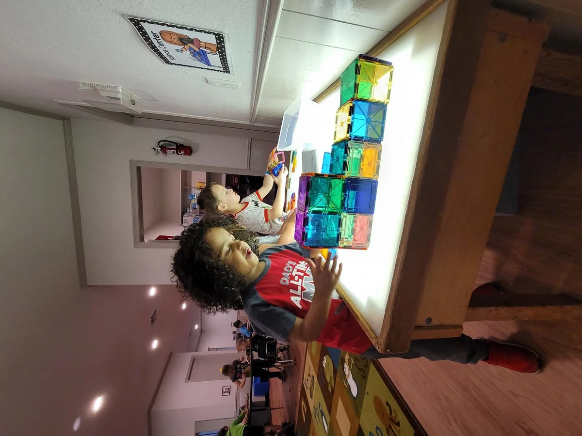 Children engaged in circle time learning activities